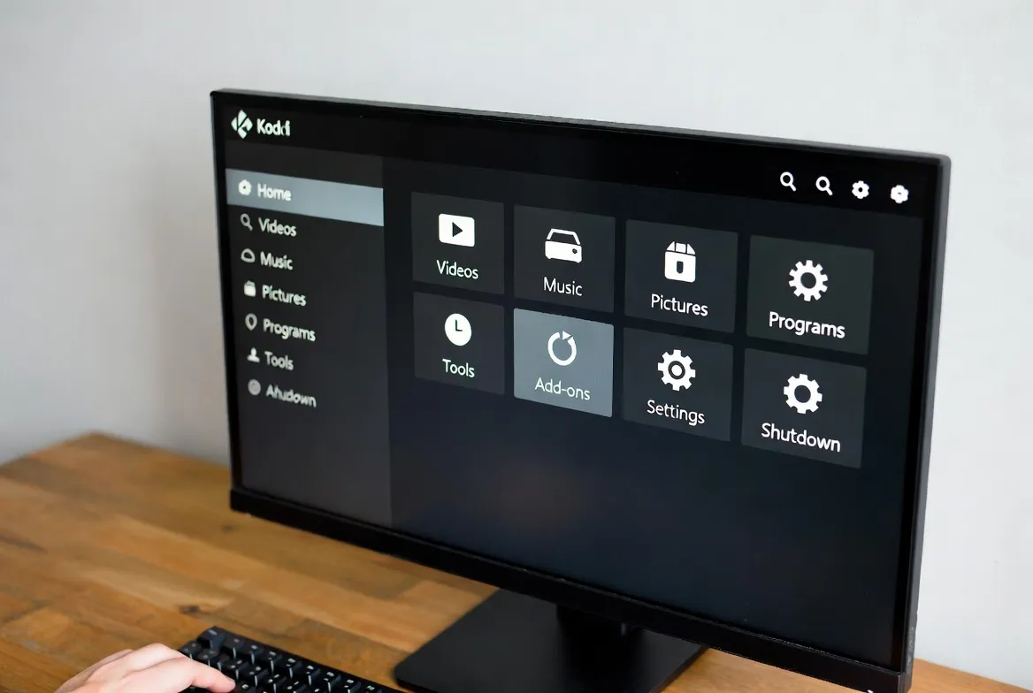 Kodi media center home screen on a desktop monitor ready for IPTV addon install