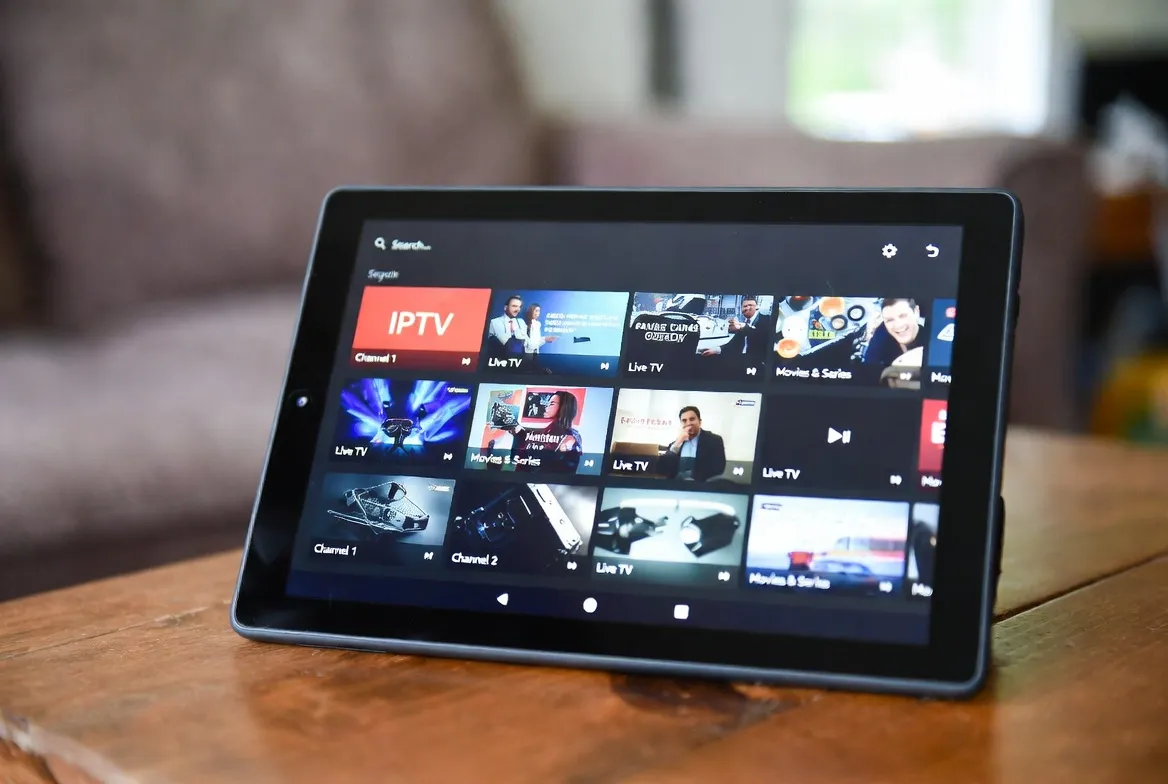 IPTV app running on an Amazon Fire tablet with movies and live TV