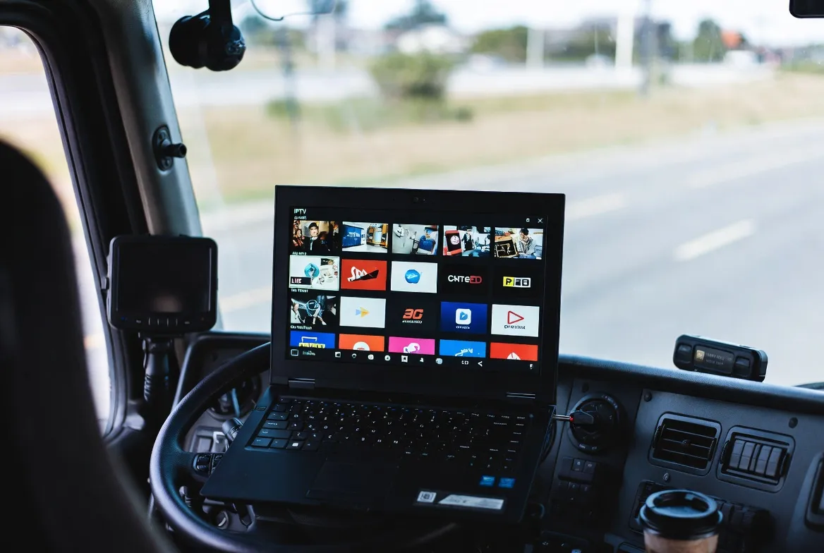 IPTV streaming on a laptop inside a long-haul truck cabin